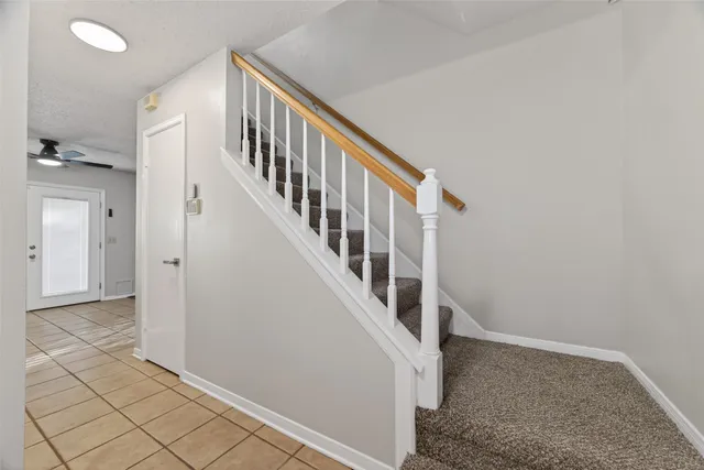 a view of an entryway with staircase