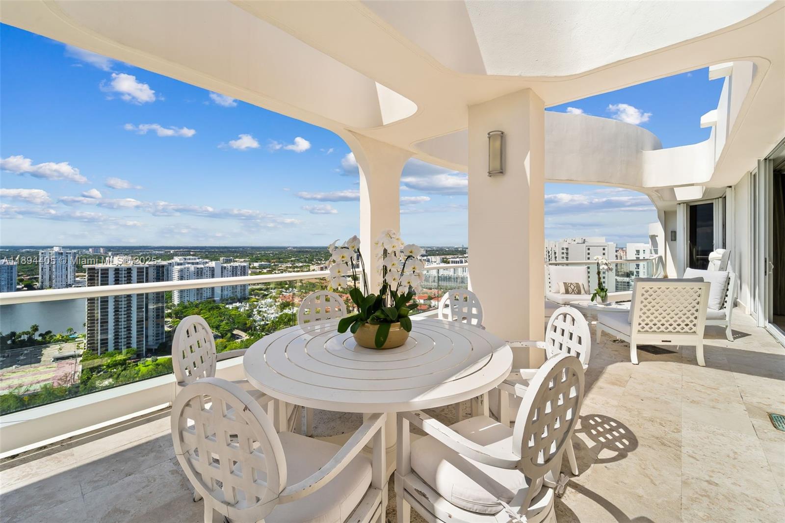 7000 Island Boulevard, Unit PH02 Aventura, FL 33160 - Photo 13 of 53 a view of a dining room with furniture window and outside view