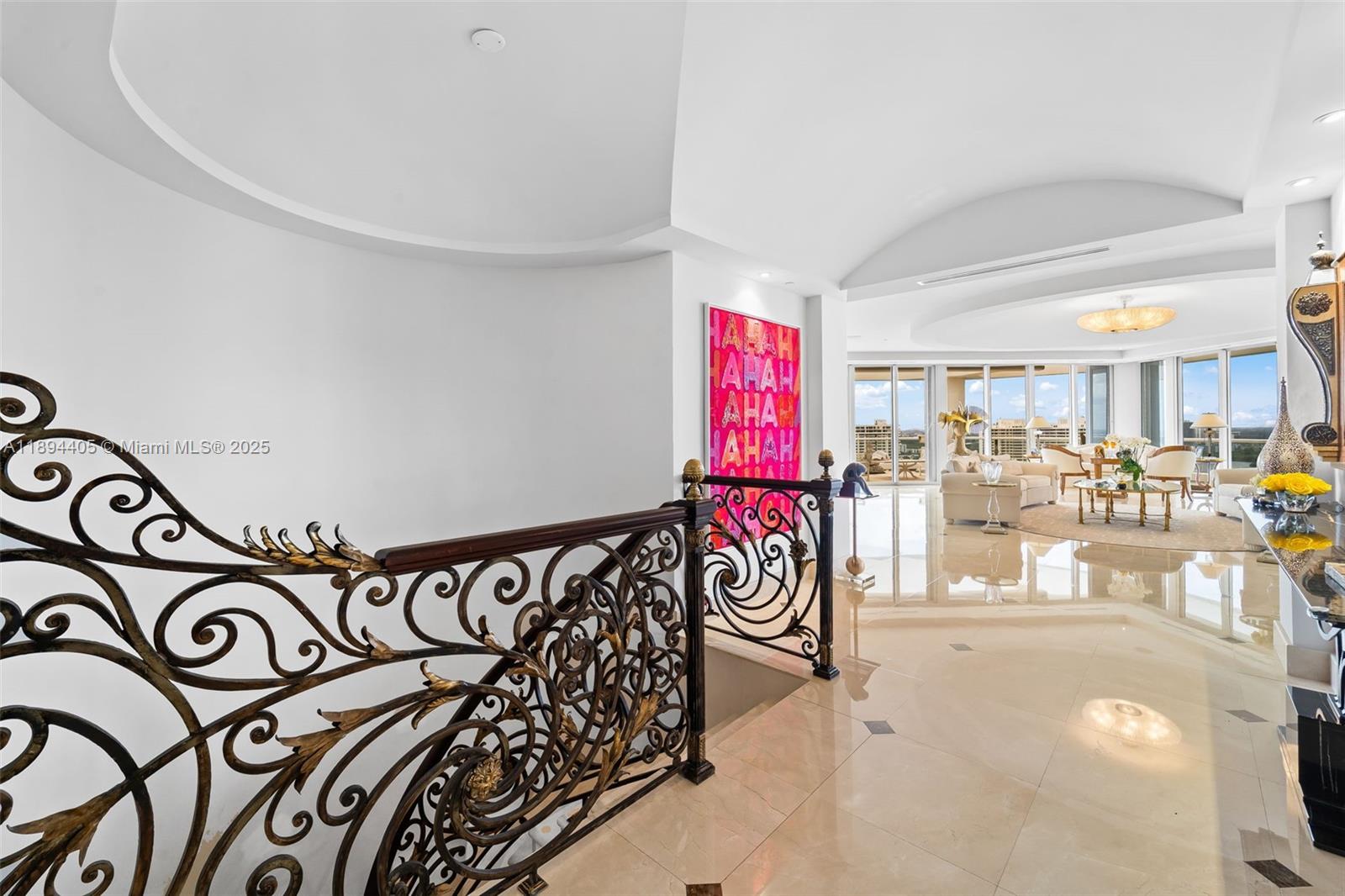 7000 Island Boulevard, Unit PH02 Aventura, FL 33160 - Photo 2 of 53 a view of a room with lots of white furniture