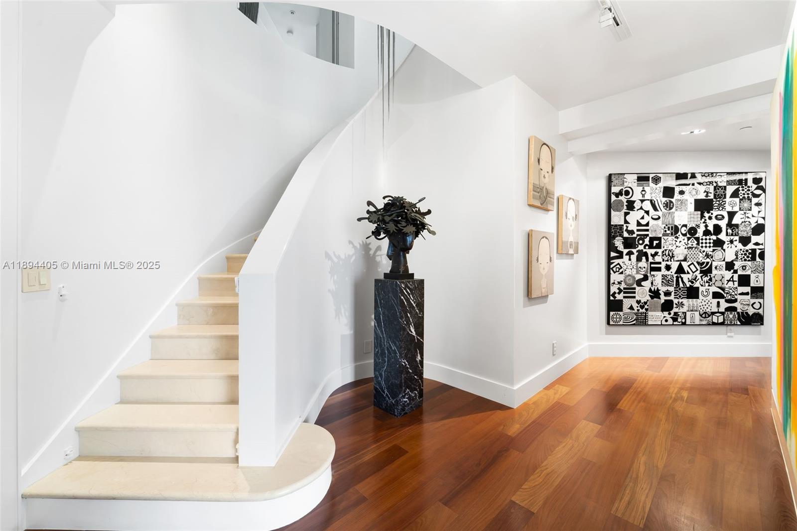 7000 Island Boulevard, Unit PH02 Aventura, FL 33160 - Photo 35 of 53 a view of entryway with wooden floor