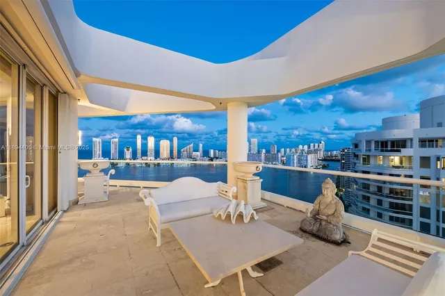 a view of a balcony with chairs