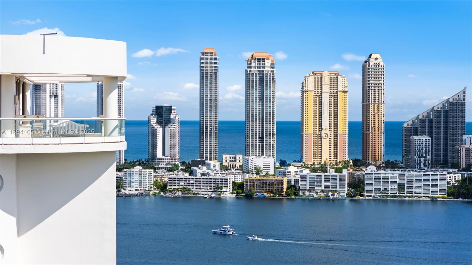 7000 Island Boulevard, Unit PH02 Aventura, FL 33160 - Photo 45 of 53 a view of a balcony with chairs