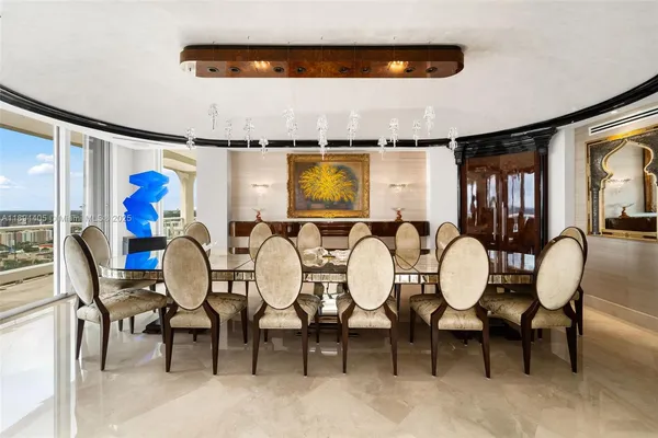 a group of people sitting on wooden floor