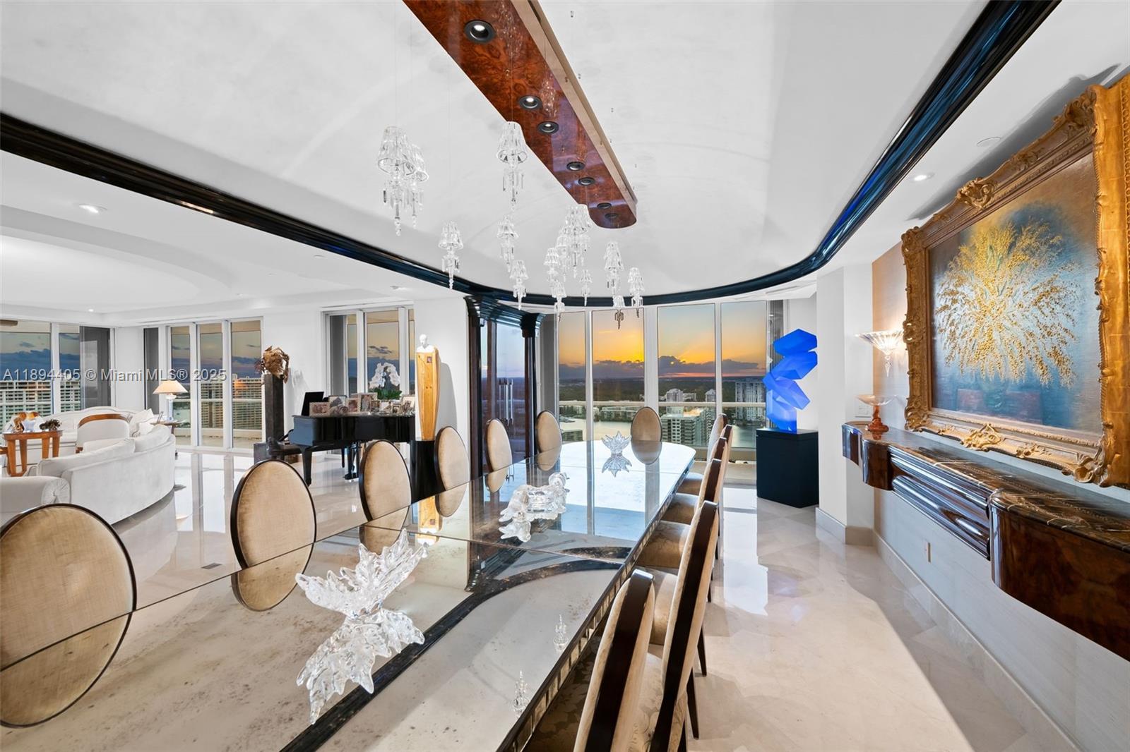 7000 Island Boulevard, Unit PH02 Aventura, FL 33160 - Photo 6 of 53 a very nice looking room with many windows and furniture