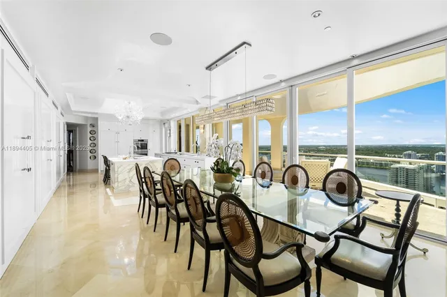 a view of a dining room with furniture window and outside view
