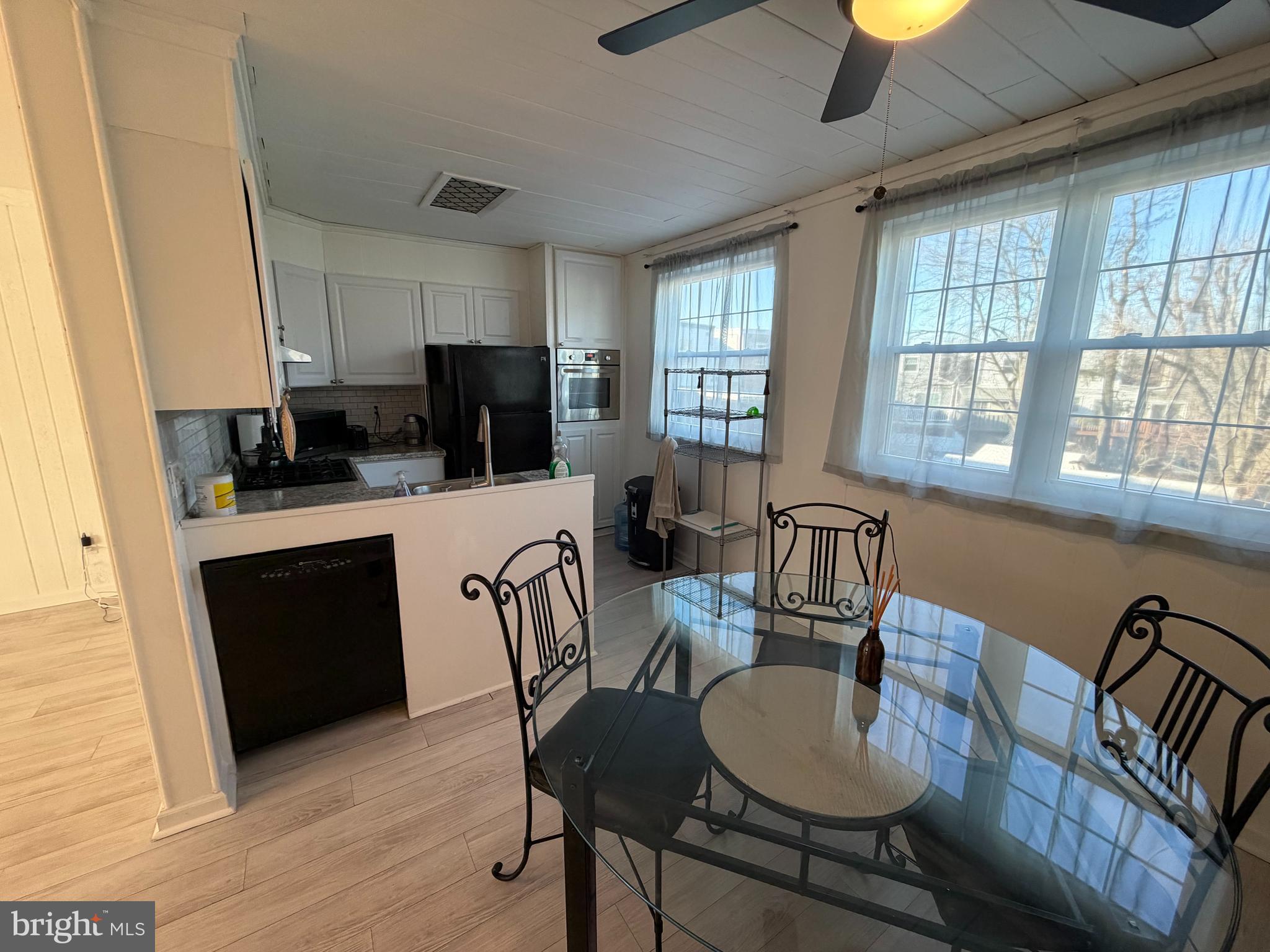 10916 Modena Place Philadelphia, PA 19154 - Photo 11 of 42 a dining room with furniture and window