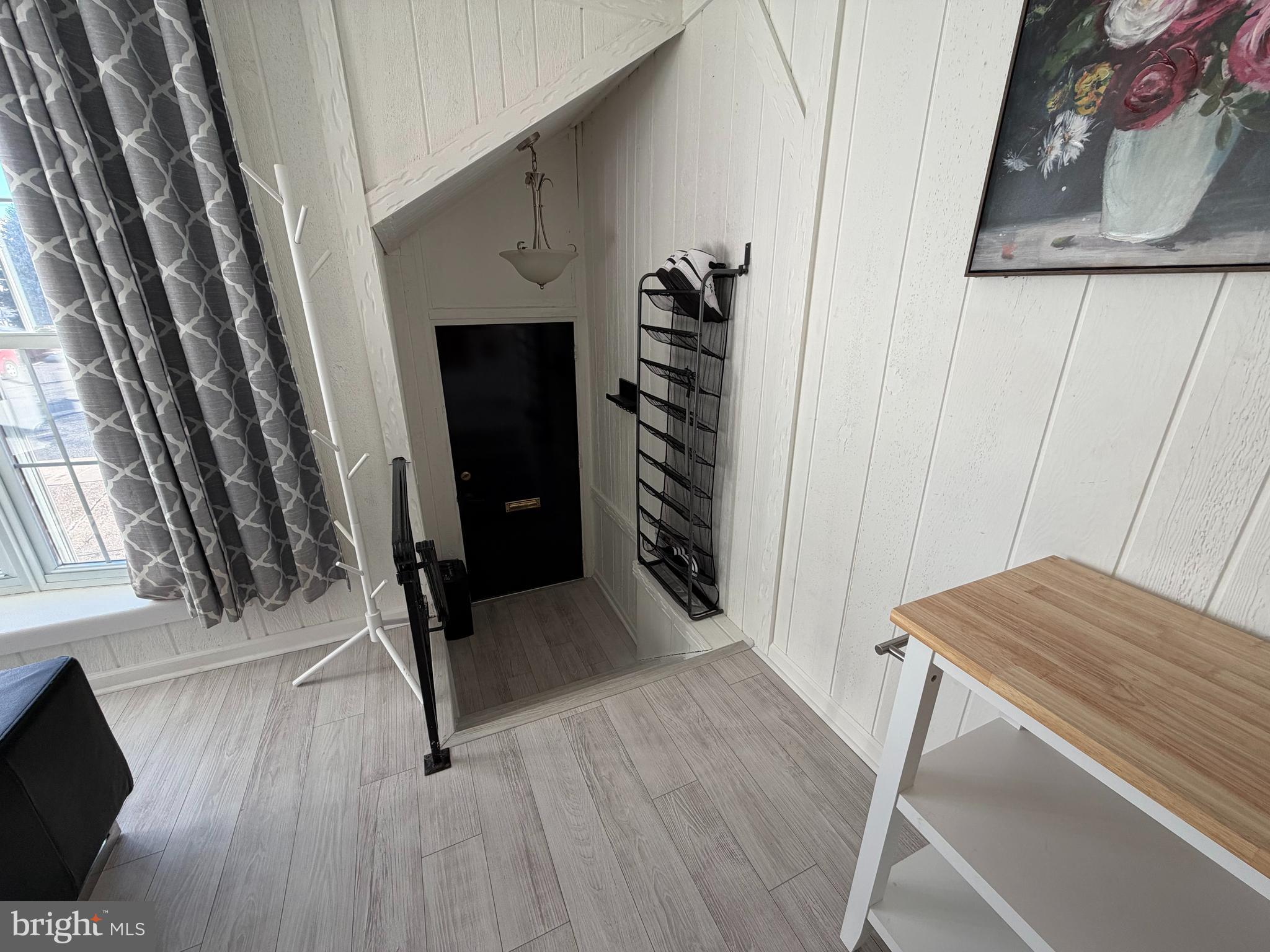 10916 Modena Place Philadelphia, PA 19154 - Photo 3 of 42 a view of a hallway with wooden floor and staircase