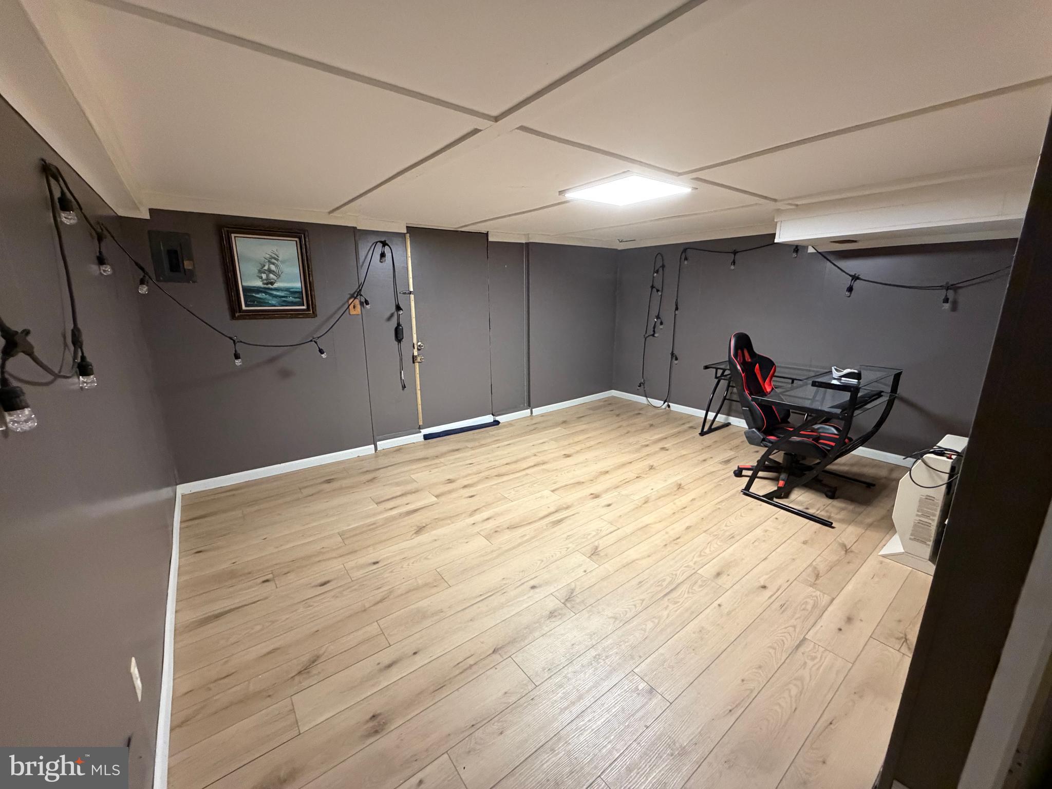 10916 Modena Place Philadelphia, PA 19154 - Photo 34 of 42 a room with wooden floor and white walls