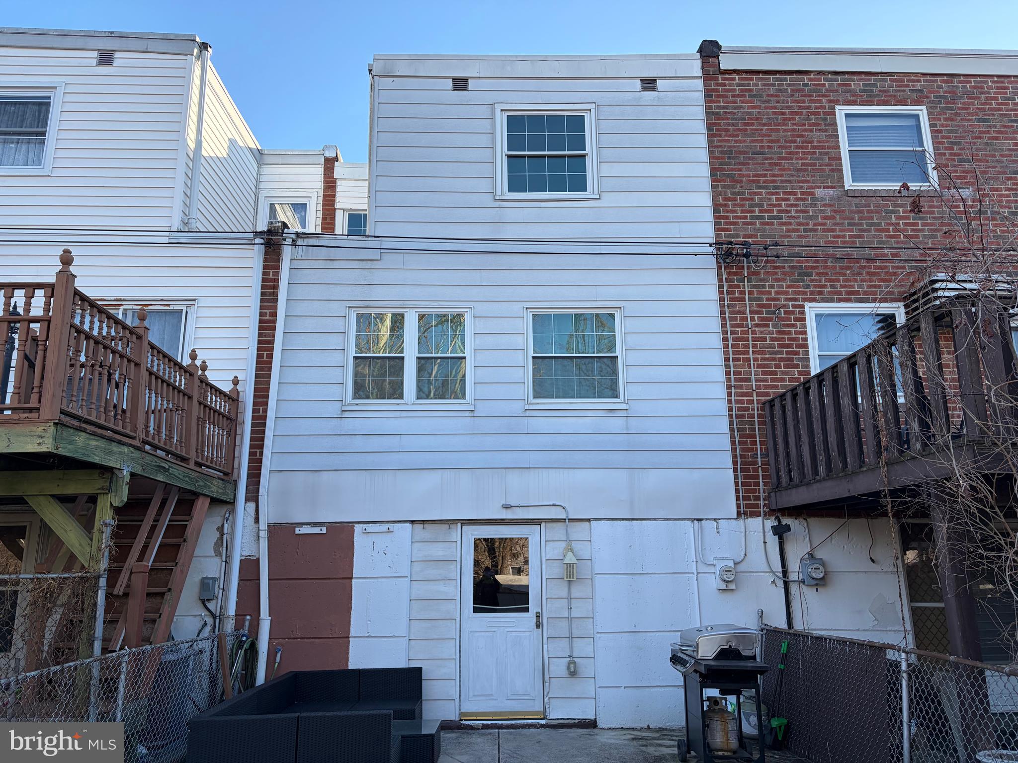 10916 Modena Place Philadelphia, PA 19154 - Photo 38 of 41 a brick building with a door and a window