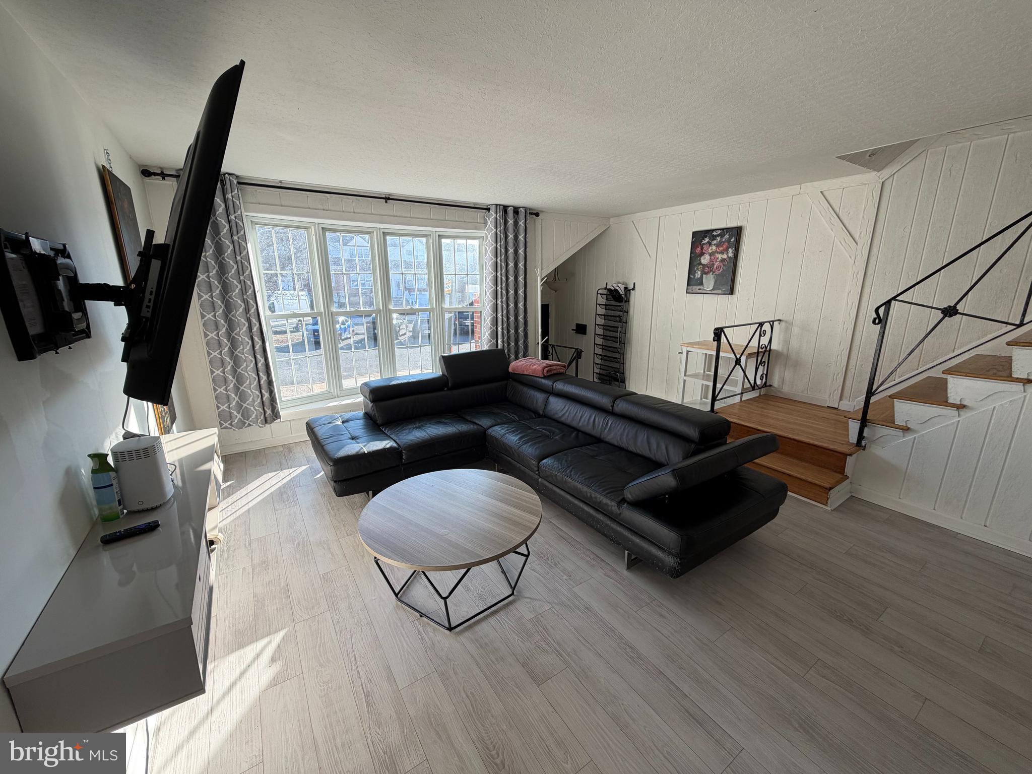 10916 Modena Place Philadelphia, PA 19154 - Photo 4 of 42 a living room with furniture and a large window