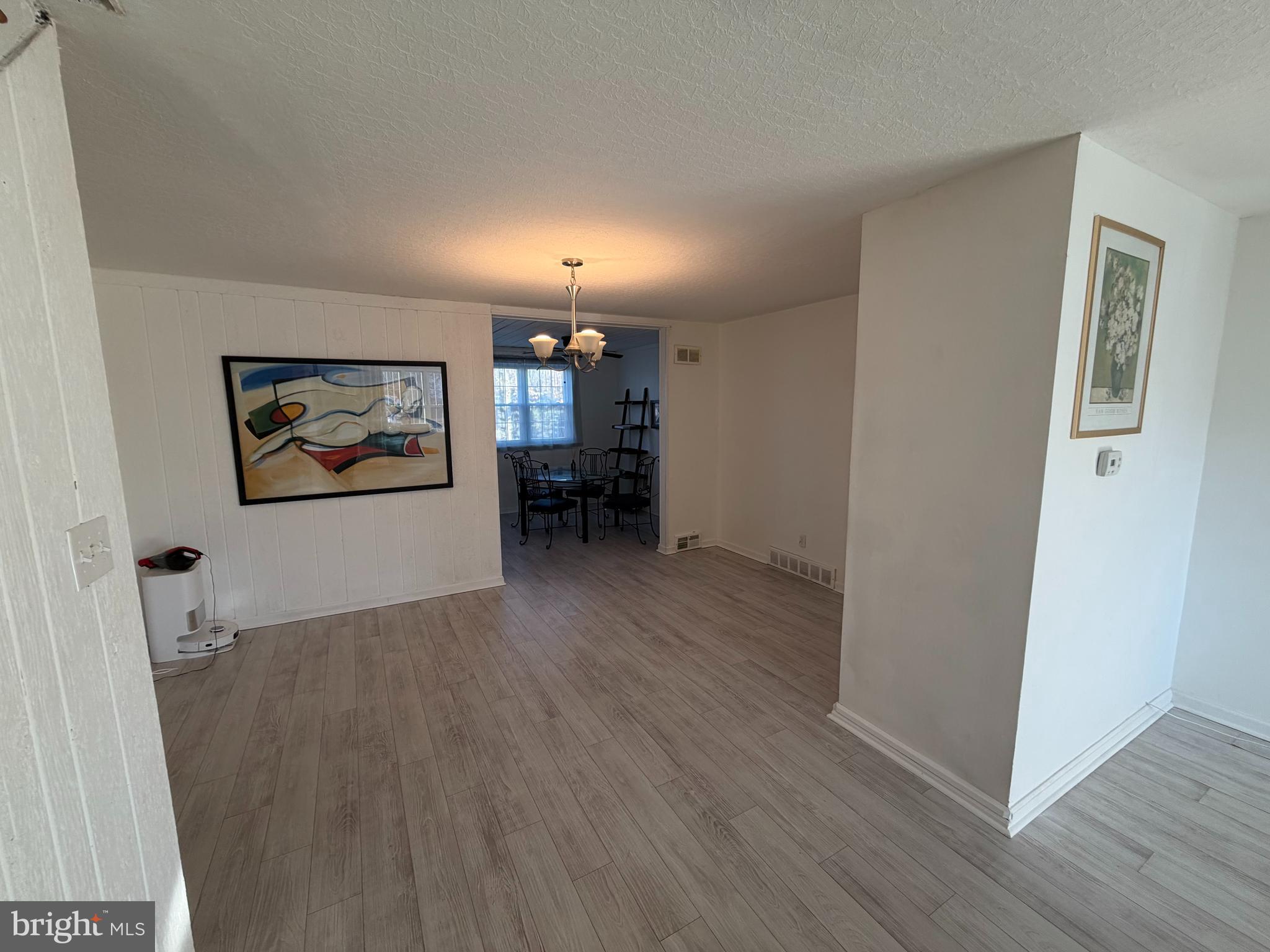 10916 Modena Place Philadelphia, PA 19154 - Photo 7 of 41 wooden floor in an empty room with a window