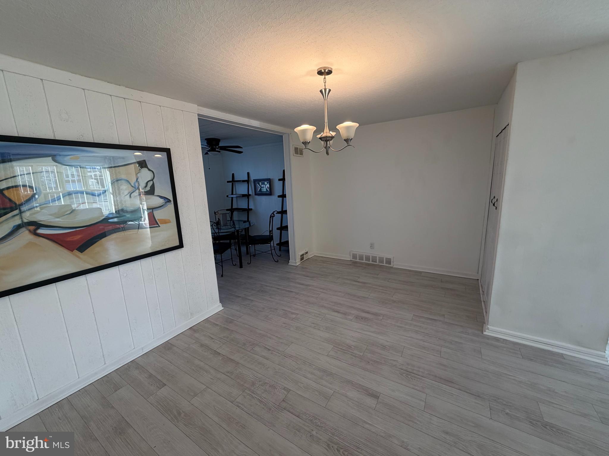 10916 Modena Place Philadelphia, PA 19154 - Photo 9 of 42 wooden floor in an empty room with a window