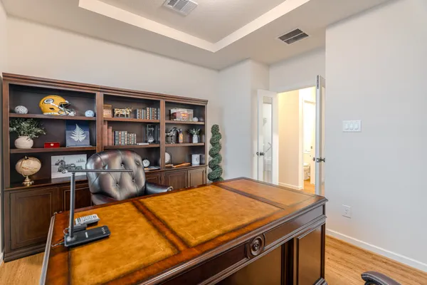 a room with furniture closet and window