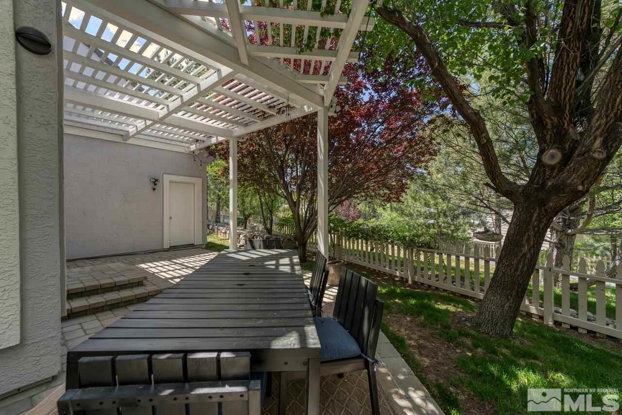 1735 Hunter Creek Road Reno, NV 89519 - Photo 25 of 30 a view of a patio with iron fence