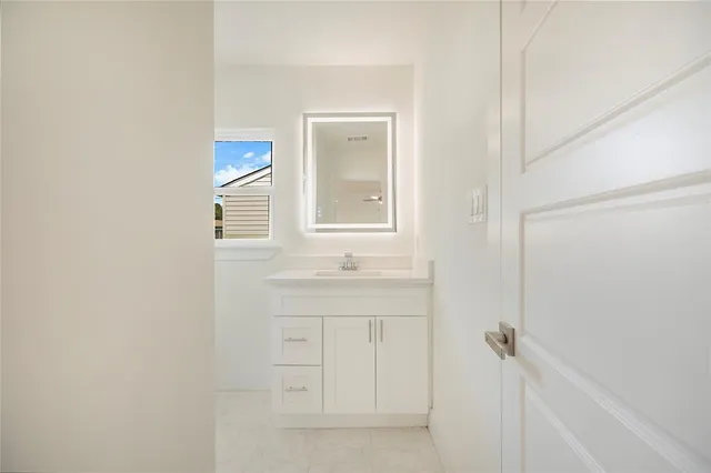 a bathroom with a shower and a toilet