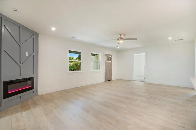 a view of an empty room with a window