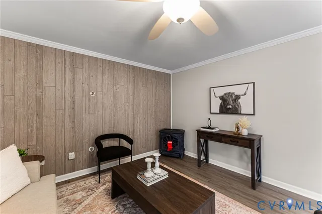 a living room with furniture and a piano