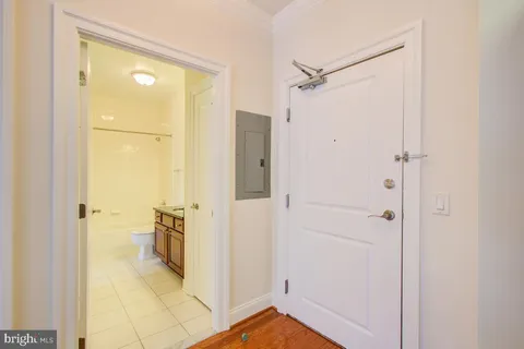 a view of a bathroom with a shower and a sink
