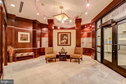 a outdoor space with lots of tables and chairs