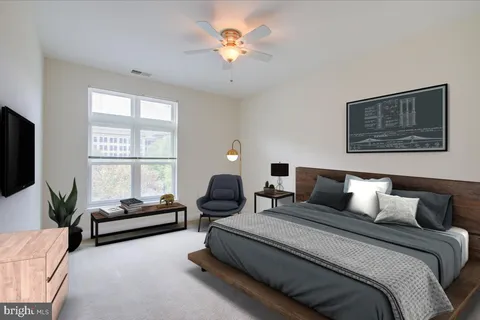 a bed room with bed and a couch