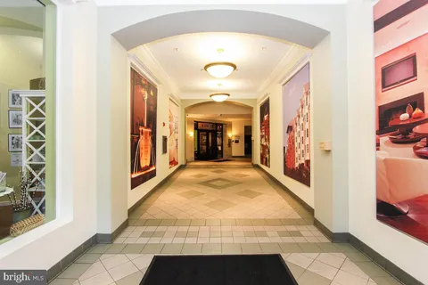 a view of a hallway with windows
