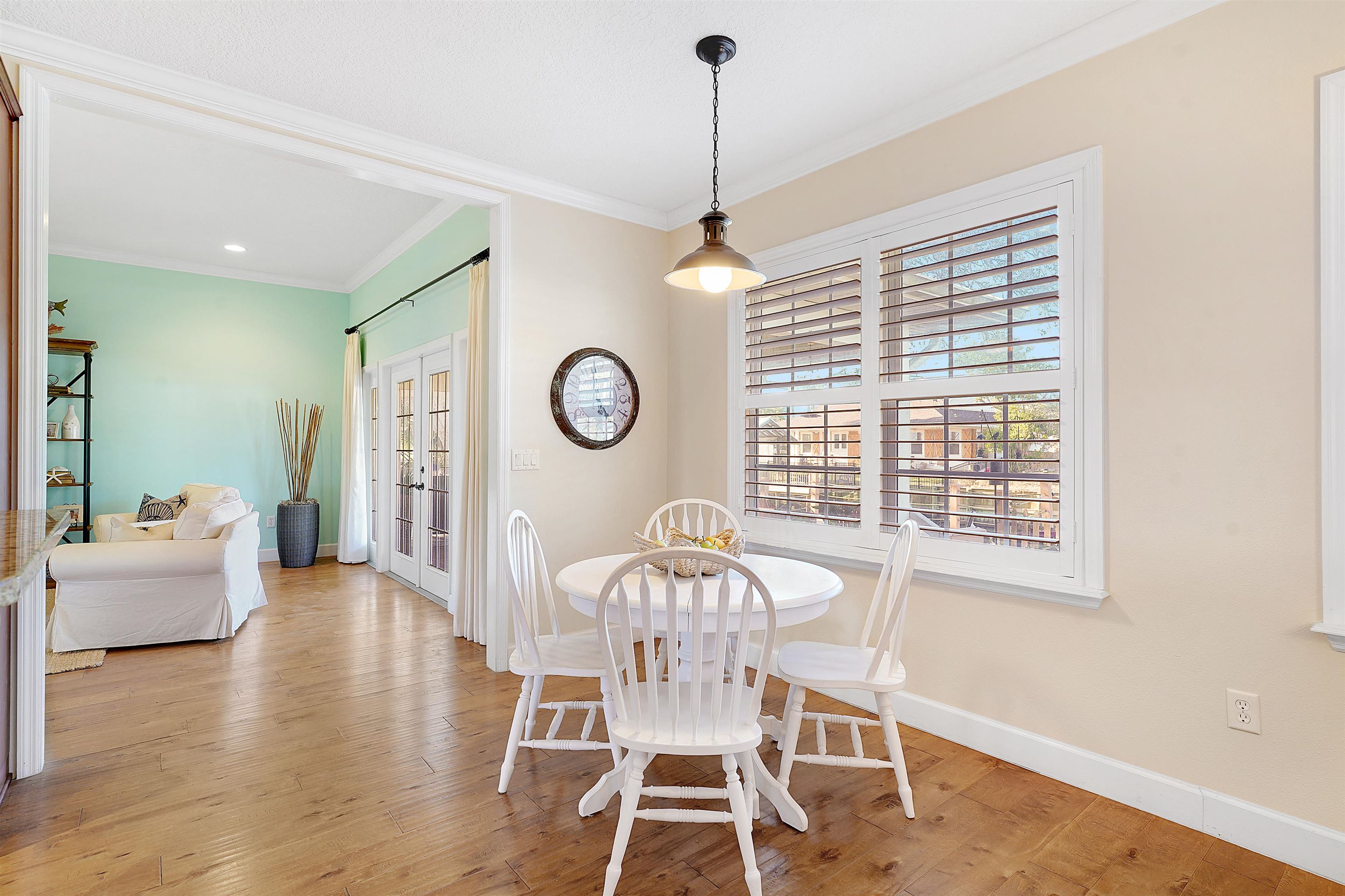 248 Pizarro Road St. Augustine, FL 32080 - Photo 17 of 53 Dining room with french doors, light wood-type flooring, and crown molding