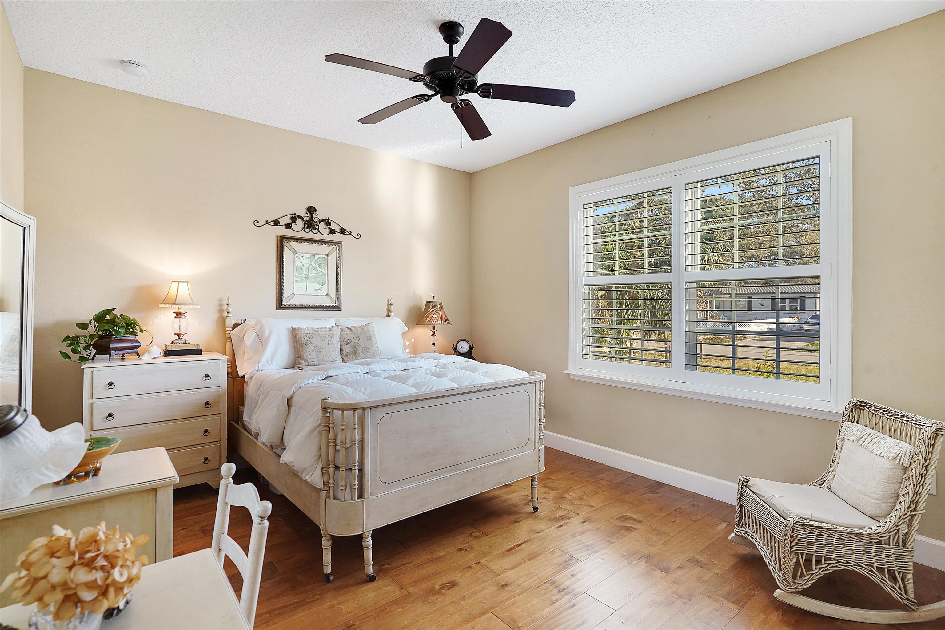 248 Pizarro Road St. Augustine, FL 32080 - Photo 30 of 53 Bedroom with light wood-style floors and ceiling fan