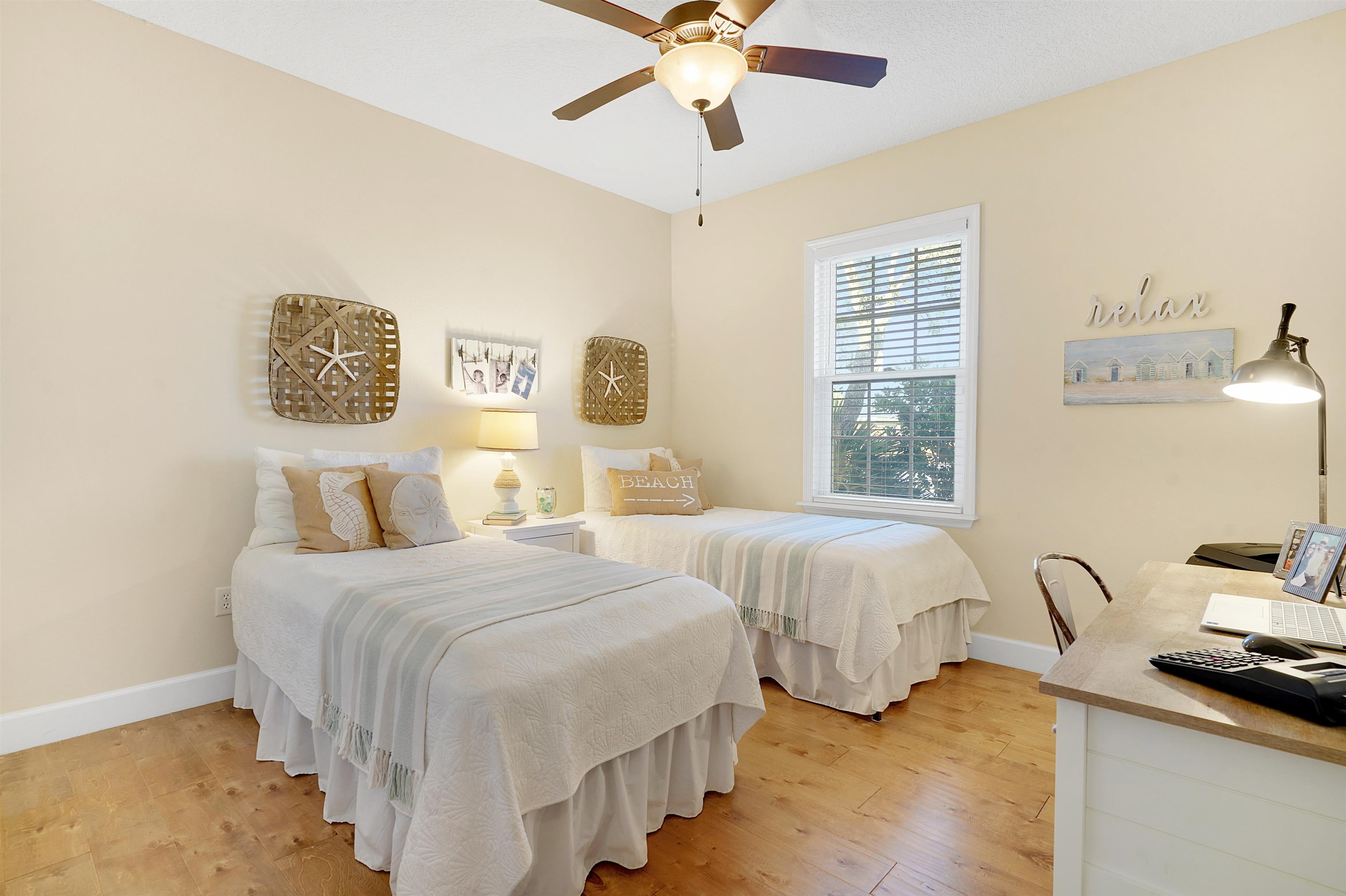 248 Pizarro Road St. Augustine, FL 32080 - Photo 34 of 53 Bedroom featuring light wood-style floors, ceiling fan, and a desk