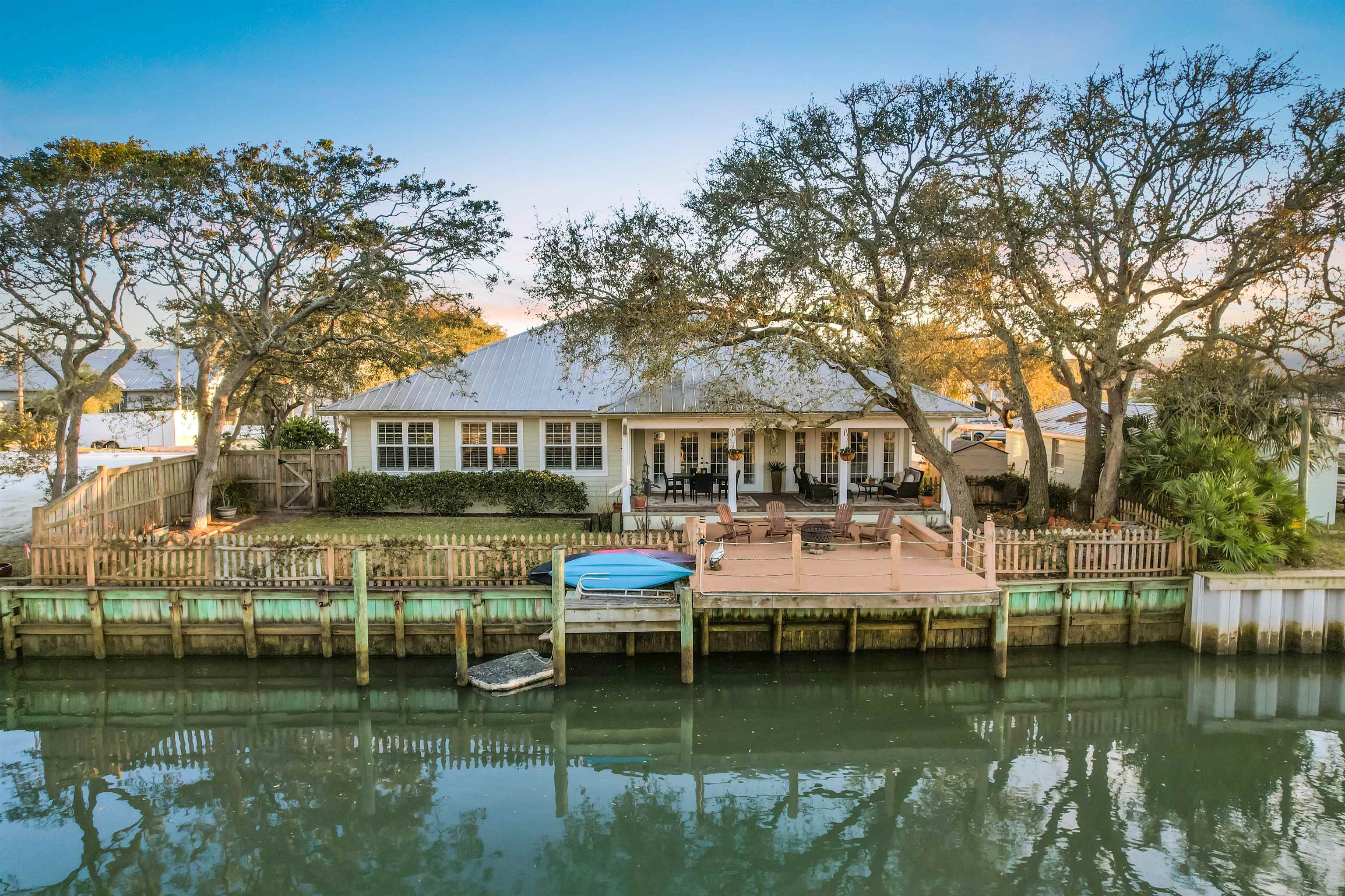 248 Pizarro Road St. Augustine, FL 32080 - Photo 4 of 53 Back of property with a fenced backyard and a deck with water view