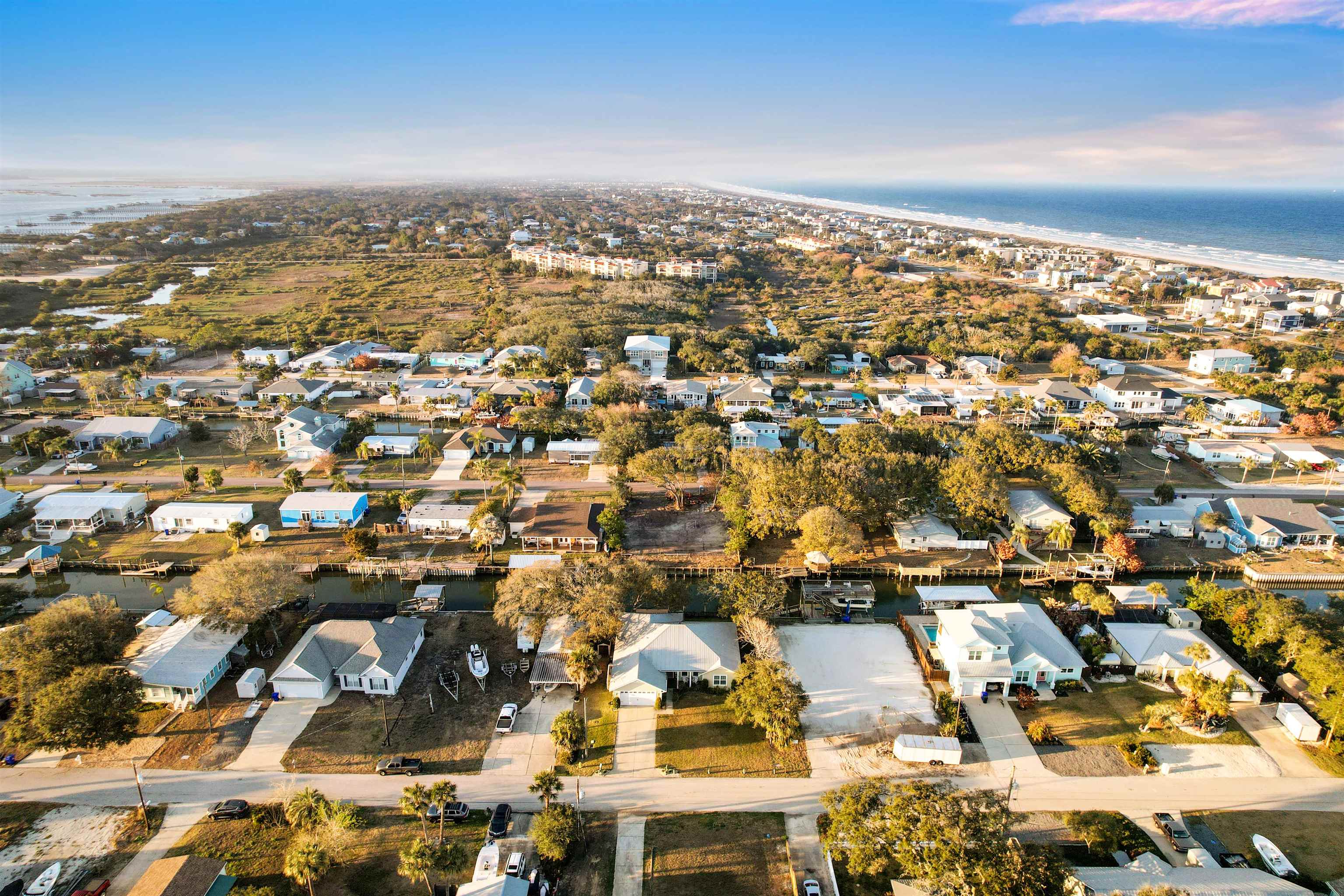 248 Pizarro Road St. Augustine, FL 32080 - Photo 49 of 53 Aerial view of property and surrounding area with nearby suburban area and a nearby body of water