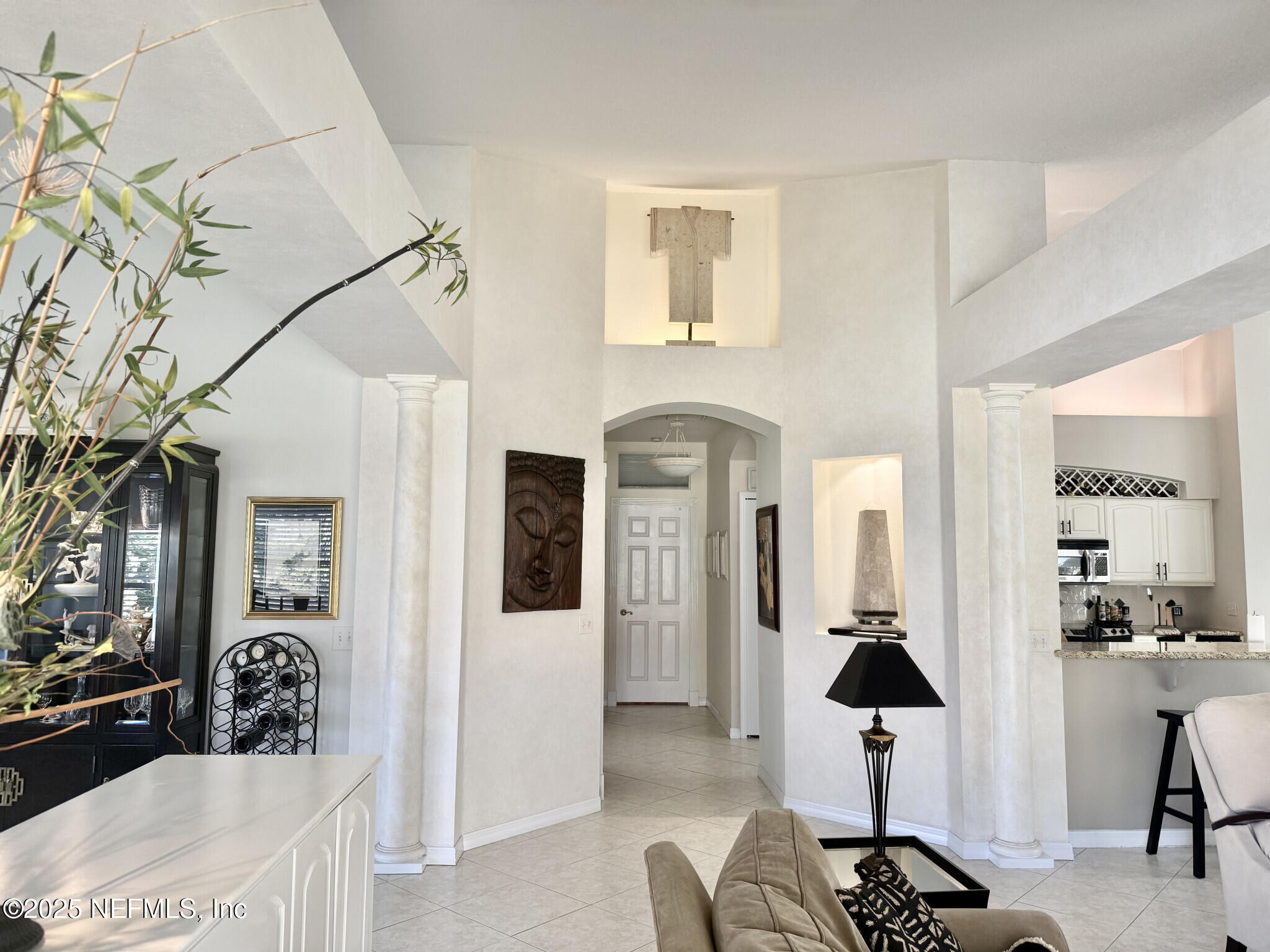 28 Spanish Waters Drive Ormond Beach, FL 32176 - Photo 11 of 44 a view of living room filled with furniture and entryway
