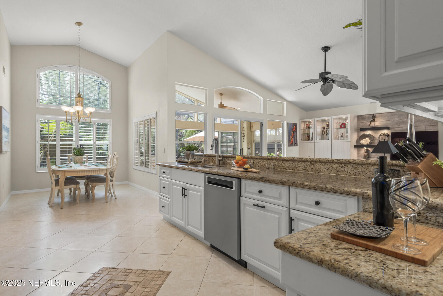 28 Spanish Waters Drive Ormond Beach, FL 32176 - Photo 18 of 44 a kitchen with sink and cabinets