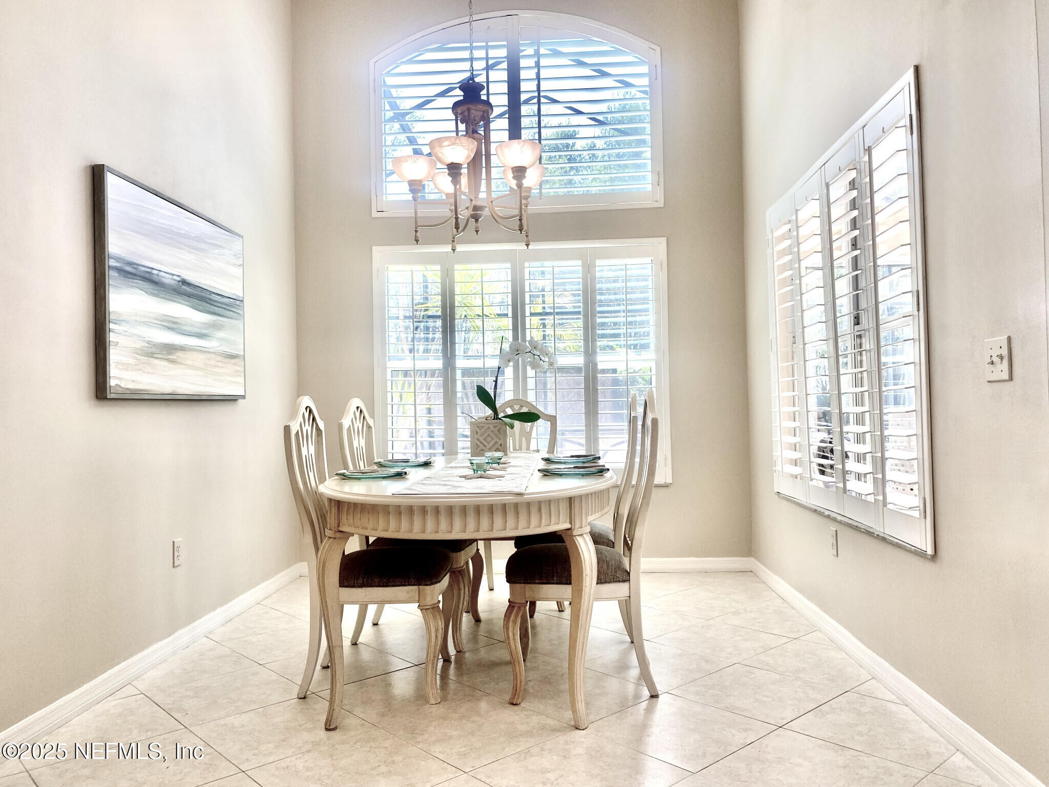 28 Spanish Waters Drive Ormond Beach, FL 32176 - Photo 19 of 44 a view of a dining room with furniture window and outside view