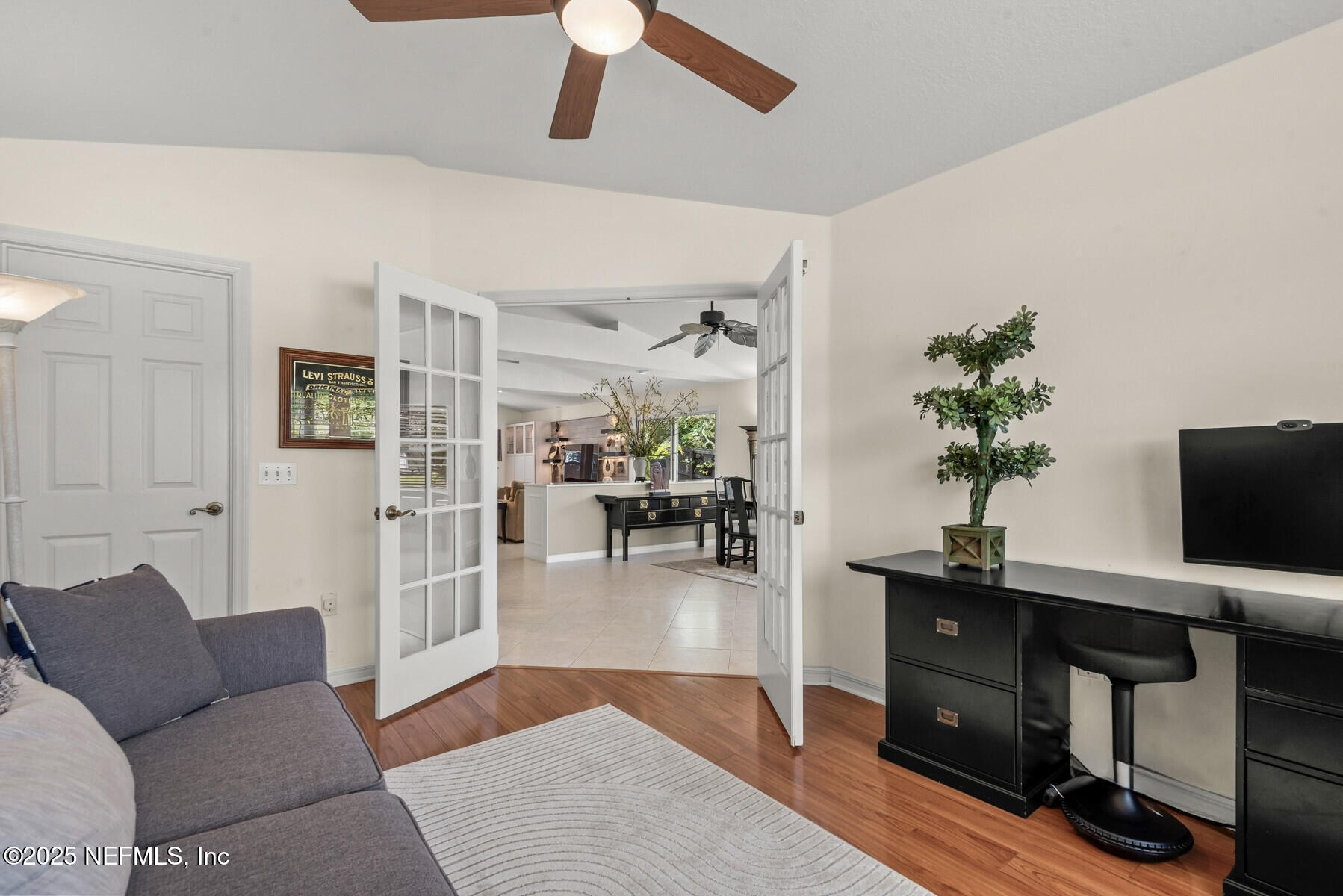 28 Spanish Waters Drive Ormond Beach, FL 32176 - Photo 28 of 44 a living room with furniture and wooden floor