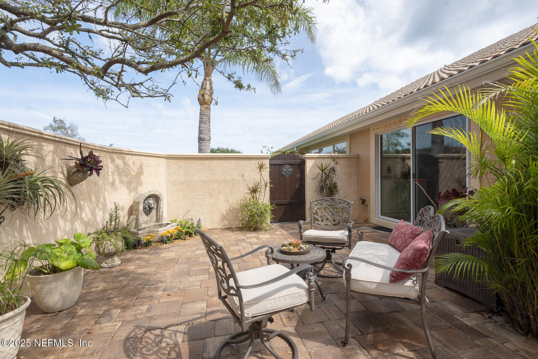 28 Spanish Waters Drive Ormond Beach, FL 32176 - Photo 34 of 44 a patio with water view