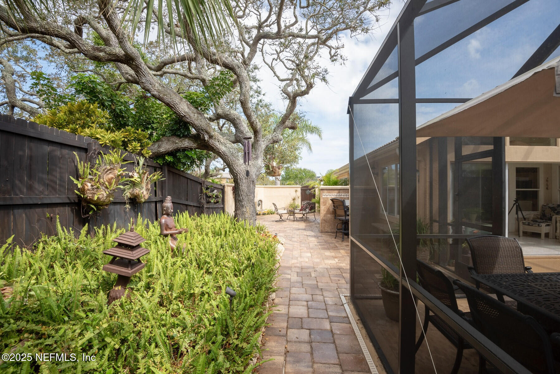 28 Spanish Waters Drive Ormond Beach, FL 32176 - Photo 35 of 44 a backyard of a house with lots of green space