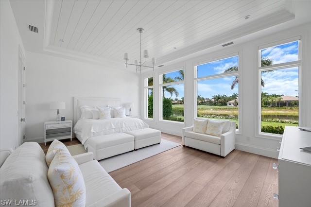 6285 Highcroft Drive Naples, FL 34119 - Photo 32 of 50 a living room with furniture and a large window