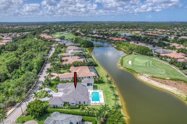 6285 Highcroft Drive Naples, FL 34119 - Photo 47 of 50 an aerial view of residential houses with outdoor space and river