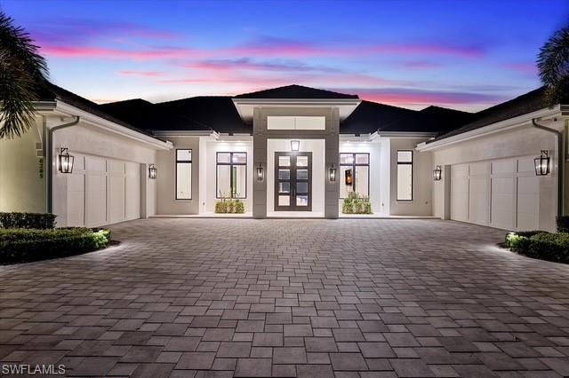 6285 Highcroft Drive Naples, FL 34119 - Photo 5 of 50 a view of a house with a yard