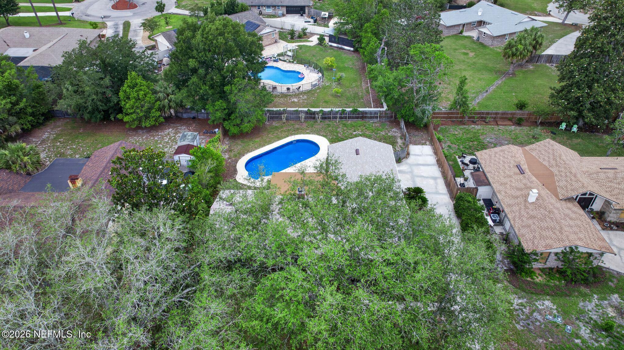 138 Ridgefield Court Orange Park, FL 32065 - Photo 57 of 64 an aerial view of a house with outdoor space pool seating area and yard