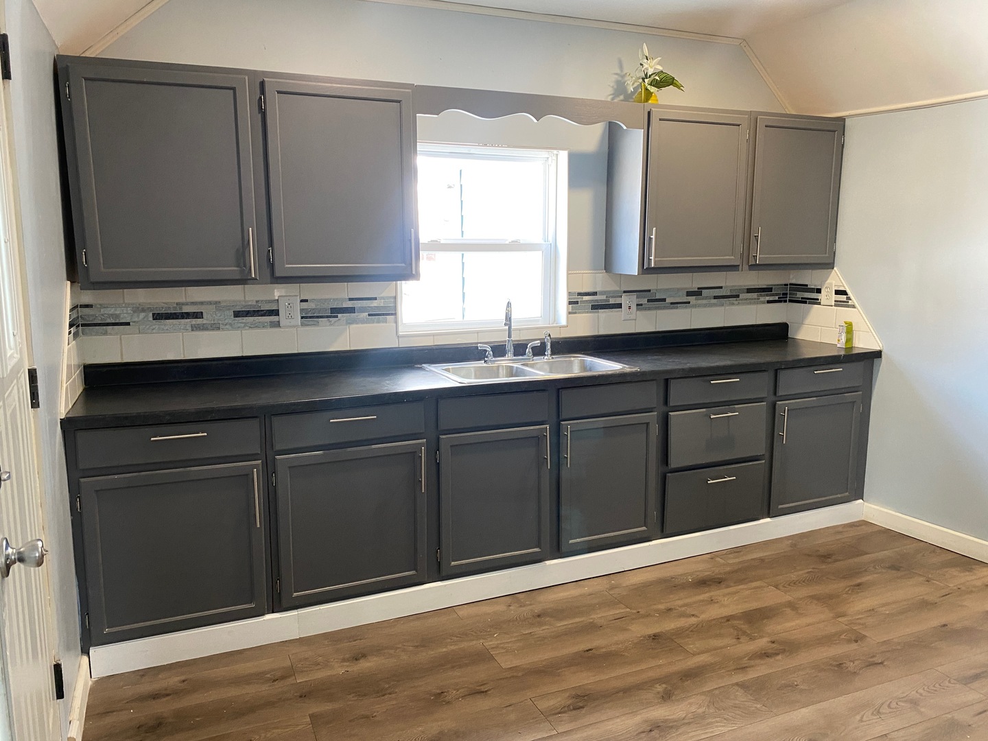 405 6th Street Mendota, IL 61342 - Photo 9 of 21 a view of a sink a mirror and a window