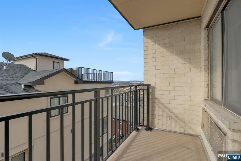233 12th Street, Unit 3H Palisades Park, NJ 07650 - Photo 10 of 10 a view of a brick house with a window