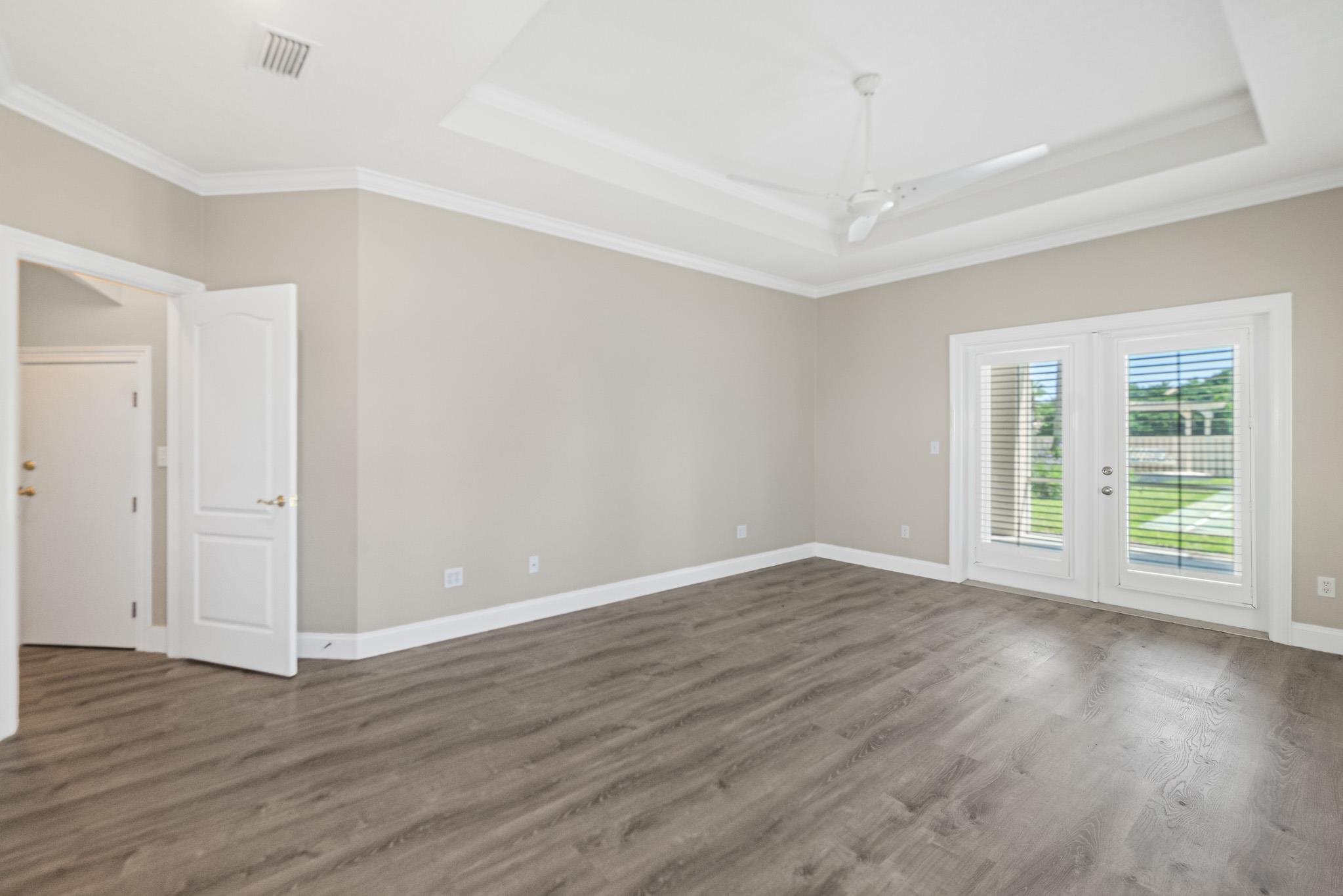 Undisclosed Address St. Augustine, FL 32080 - Photo 23 of 58 a view of an empty room with wooden floor and a window