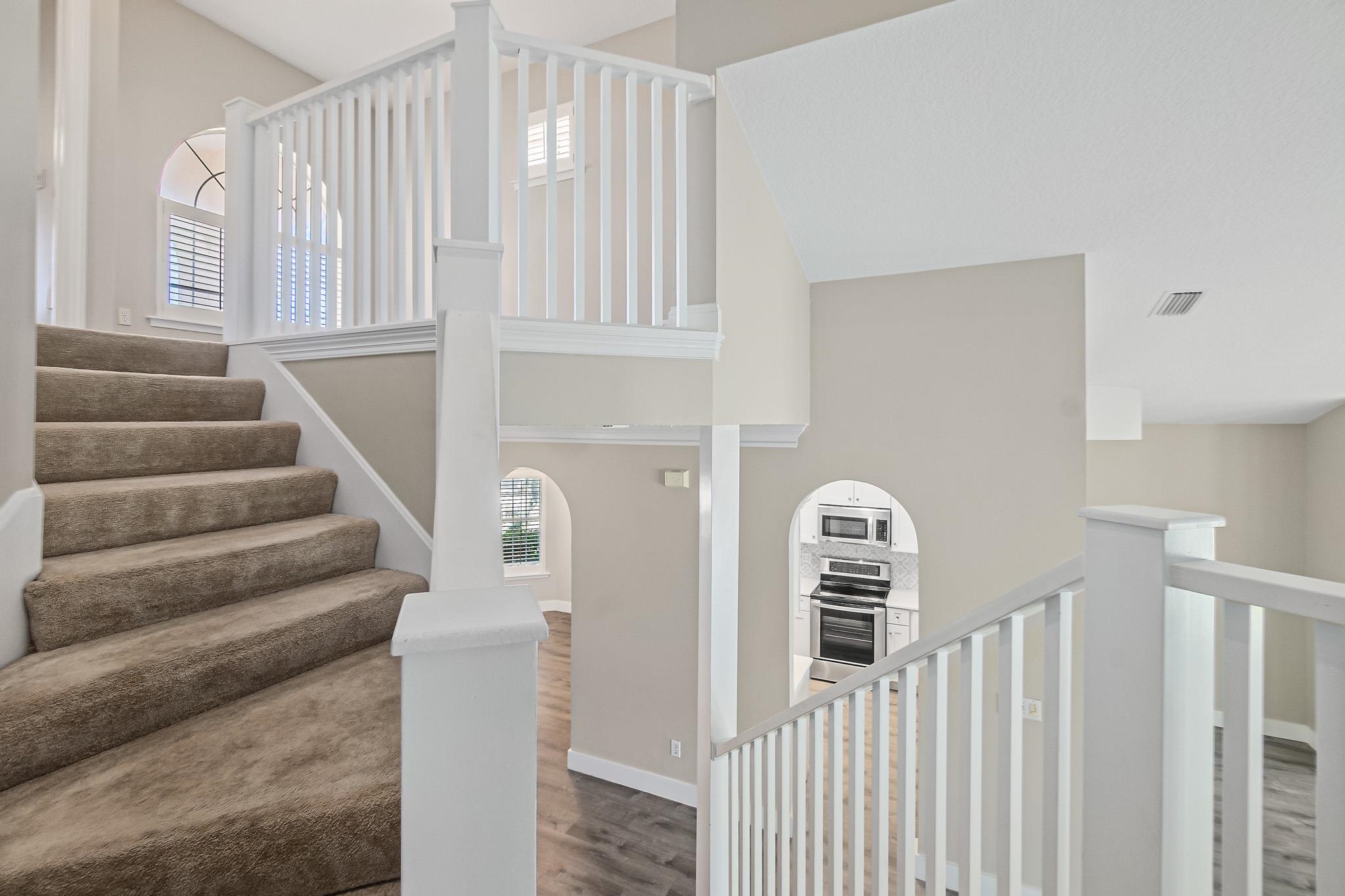 Undisclosed Address St. Augustine, FL 32080 - Photo 31 of 58 a view of a hallway with staircase