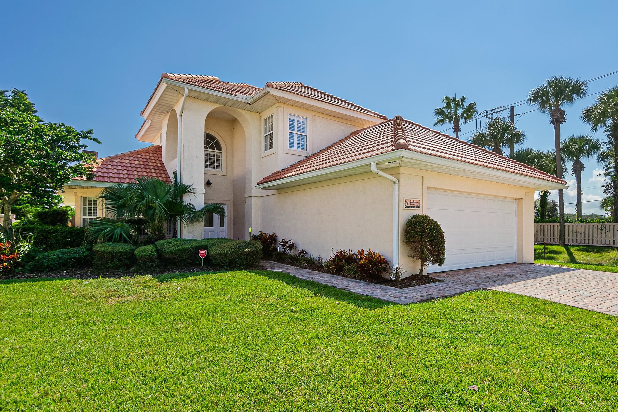 Undisclosed Address St. Augustine, FL 32080 - Photo 50 of 58 a front view of a house with a yard