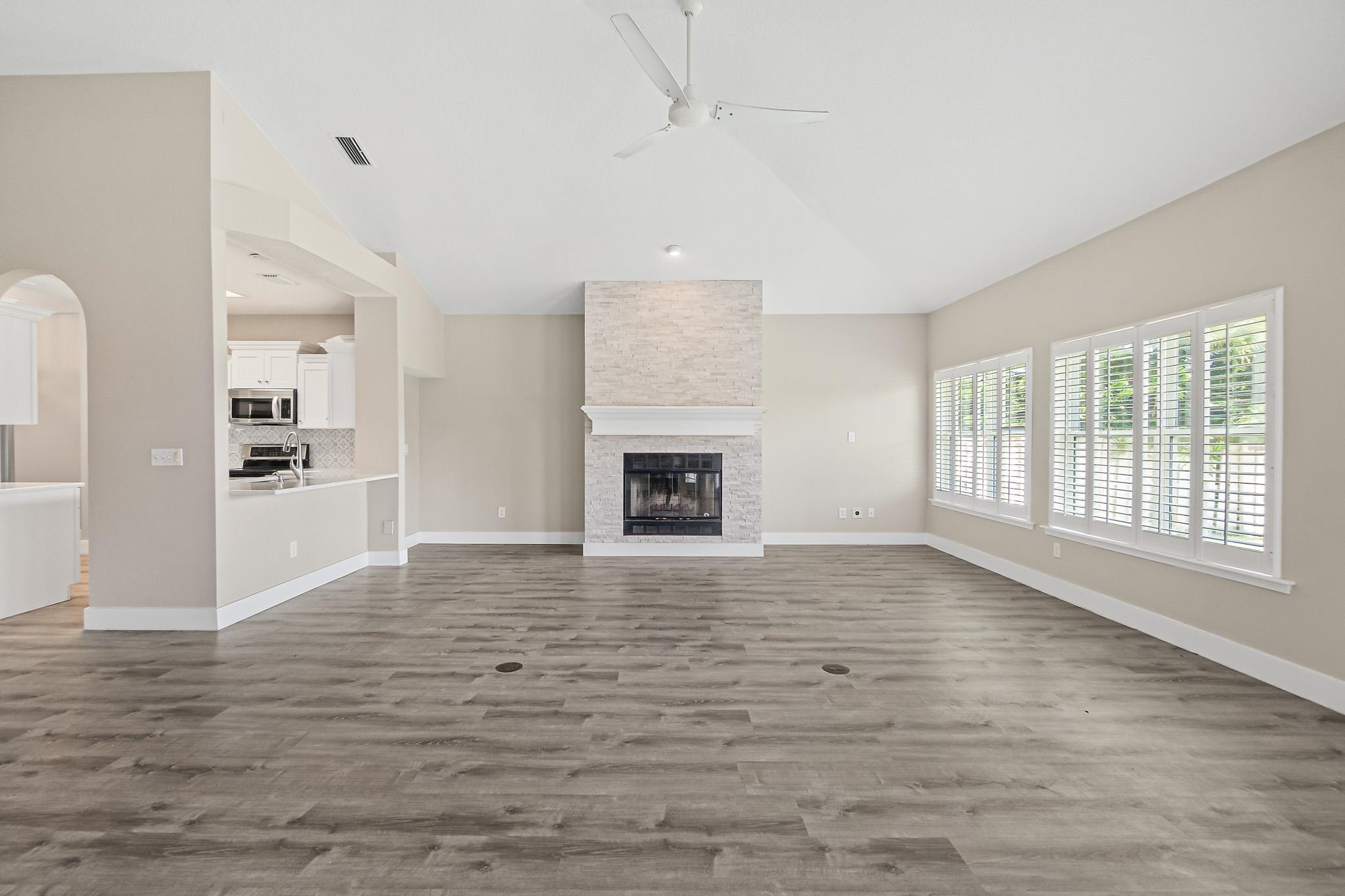 Undisclosed Address St. Augustine, FL 32080 - Photo 10 of 58 a view of an empty room with window and wooden floor