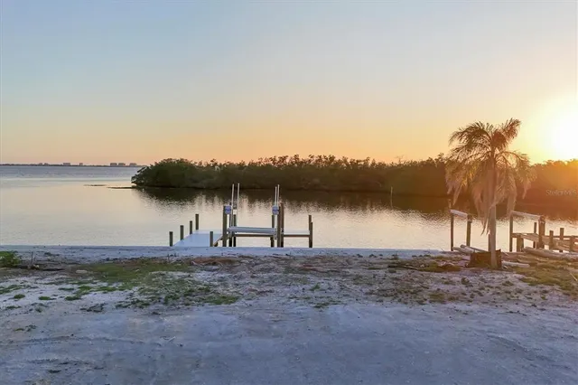 a house view with a lake view