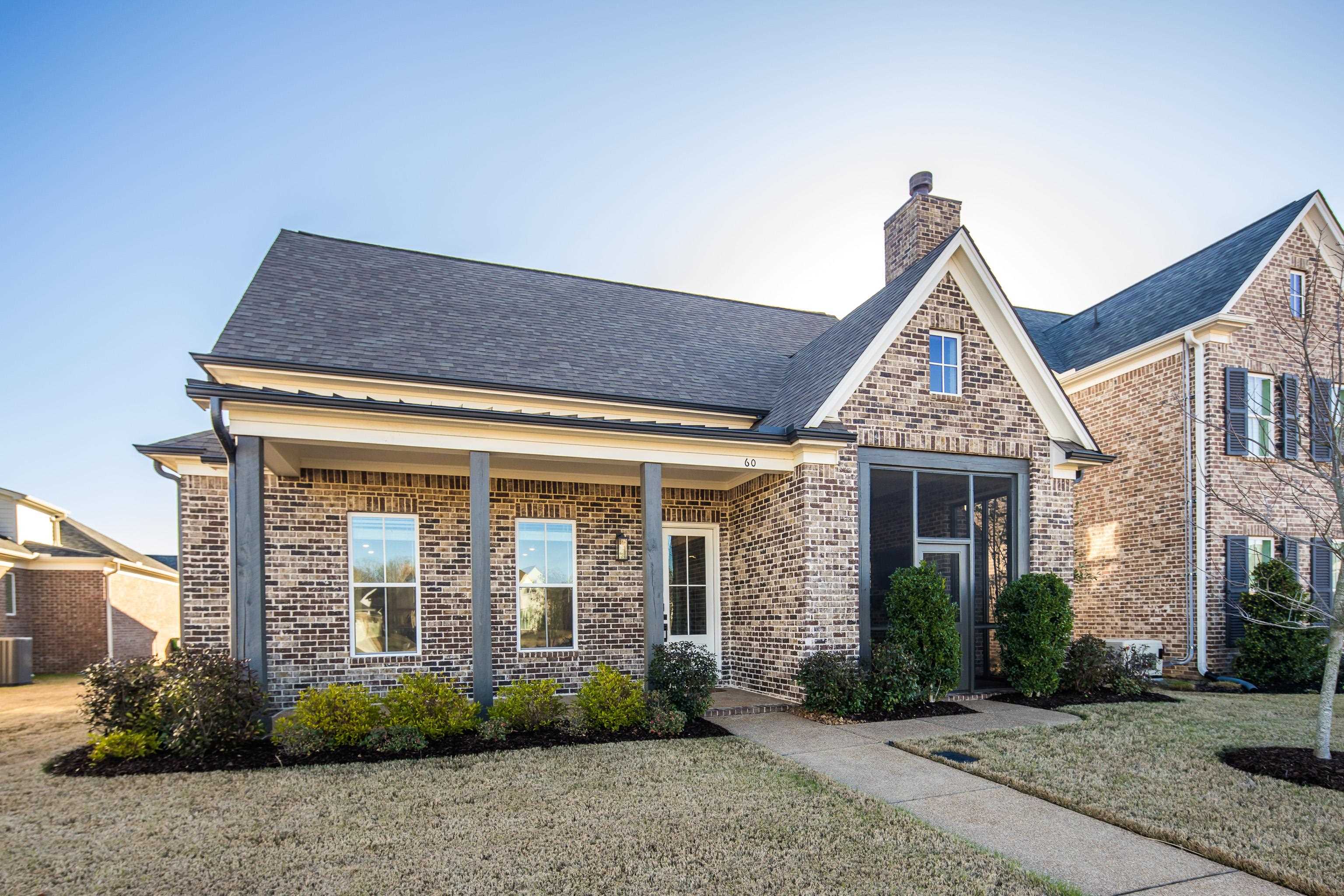 60 Old Pasture Lane Collierville, TN 38017 - Photo 1 of 36 a front view of a house with garden
