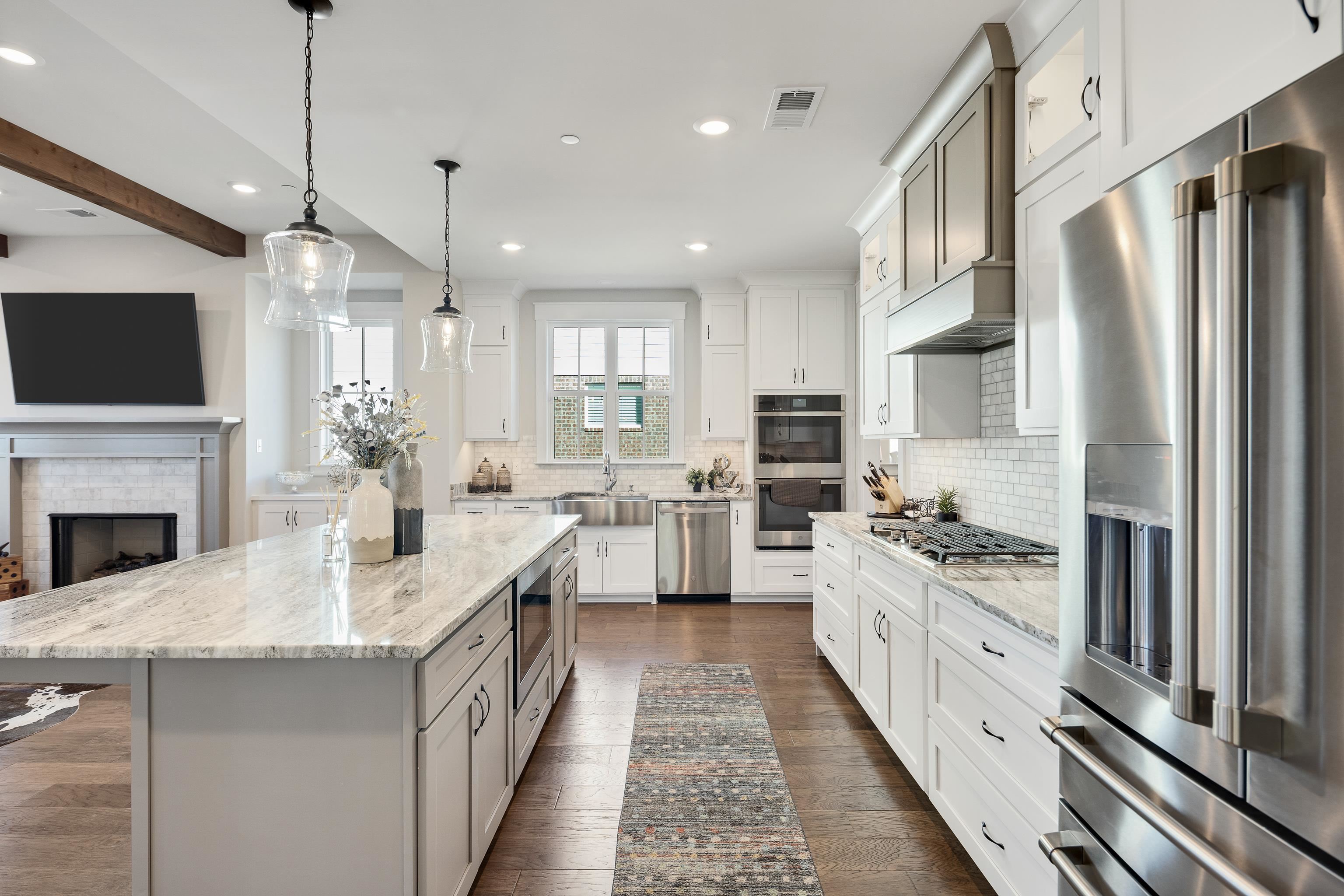 60 Old Pasture Lane Collierville, TN 38017 - Photo 14 of 36 a kitchen with stainless steel appliances granite countertop a refrigerator a oven stove top oven and sink