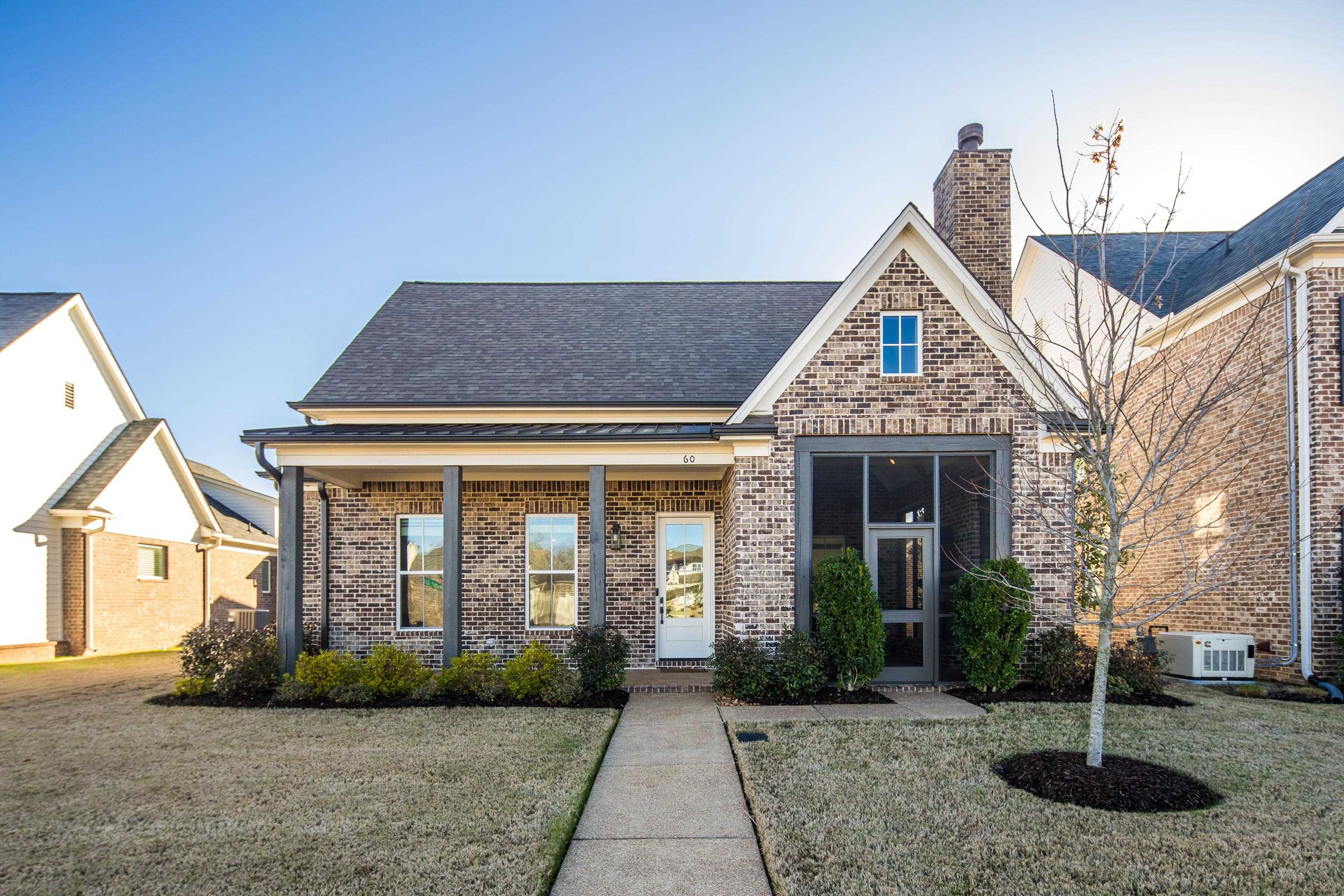 60 Old Pasture Lane Collierville, TN 38017 - Photo 36 of 36 a front view of a house with garden